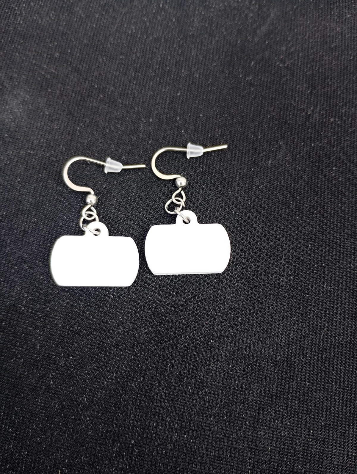 Boucles d’oreilles cartable sourire en plâtre à peindre