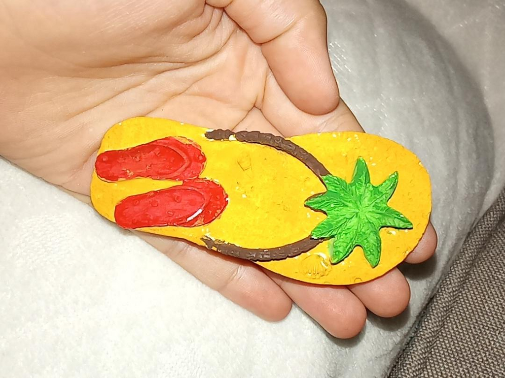 Exemple peint de la tong tropicale en plâtre